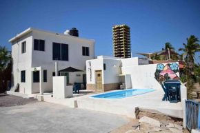 Beautiful home 4br on beach with pool and bbq